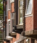 Erkers met golvende betonne strook.
              <br/>
              Marcel Westhoff, 2018-08-01